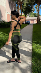 Black and green yoga pants and bra top